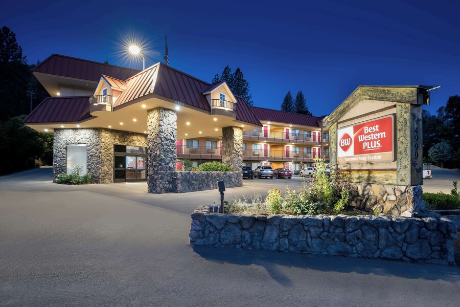 A multi-story hotel with a stone facade, multiple balconies, and a sign indicating it is the Best Western Plus Yosemite Way Station. - Best Western Plus Yosemite Way Station Motel (Mariposa)